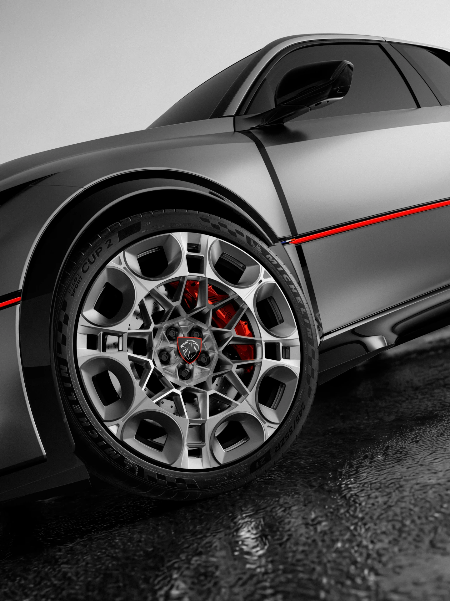 PEUGEOT E-T16 Concept dans sa teinte Gris Winchester mat, rehaussée de lignes rouges.