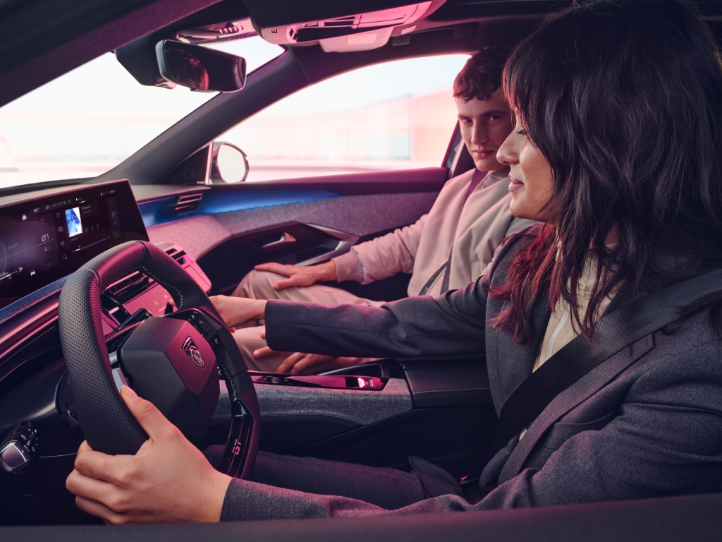 Couple inside the new PEUGEOT 3008 hybrid